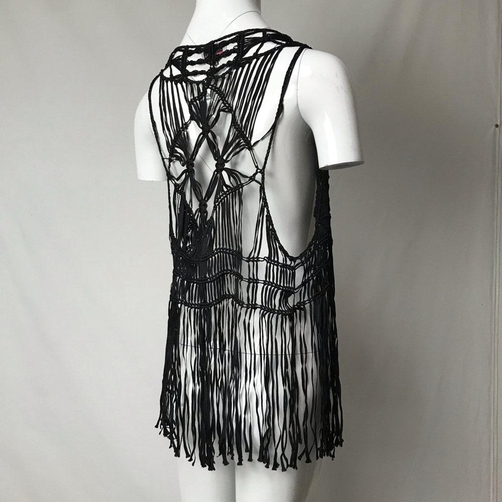 My vintage Rosa Cha black tassel woven vest